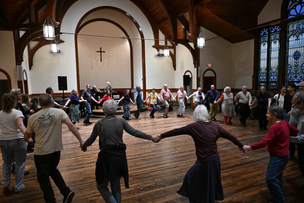 circle of dancers in the sanctuary